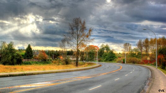 Road sky clouds photo