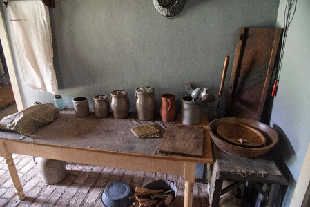 Kitchen Table of Water Jugs photo