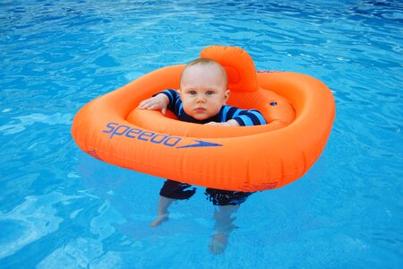 Baby swimming little photo