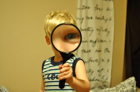 Magnifying glass child funny photo