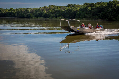 Fisheries biologist searching for invasive carp on the Illinois River