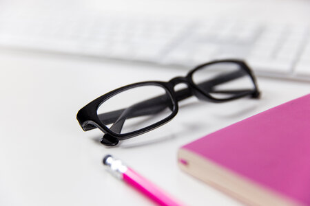 Glasses On Office Desk photo