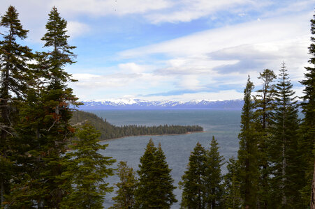 Landscape through the pine trees at Lake Tahoe in Emerald Bay photo
