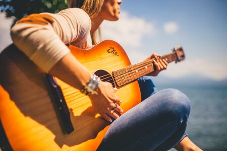 Woman Playing Guitar photo