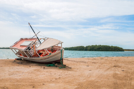 Fishing boat on the beach photo