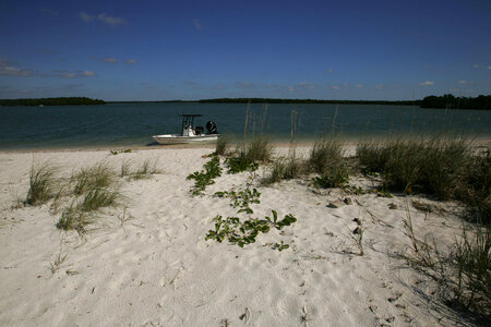 Refuge boat anchored on the beach