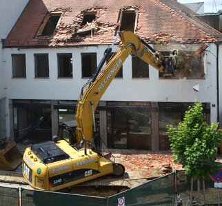 Site construction debris demolition cutter photo