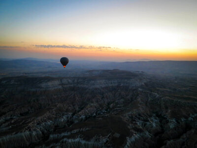 A magical moment, watching the first hot air balloon rise with the sun. photo