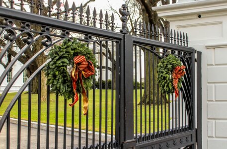 Presidential home christmas wreaths gate photo