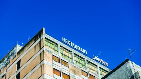 Building Top Restaurant Sign photo