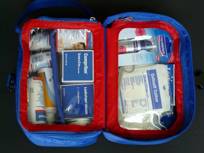 First aid red cross box container photo