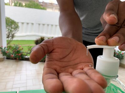 Hydroalcoholic gel hand washing man photo