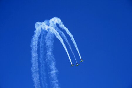 Blue sky clear sky smoke trails photo