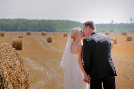 Bride broom wheatfield