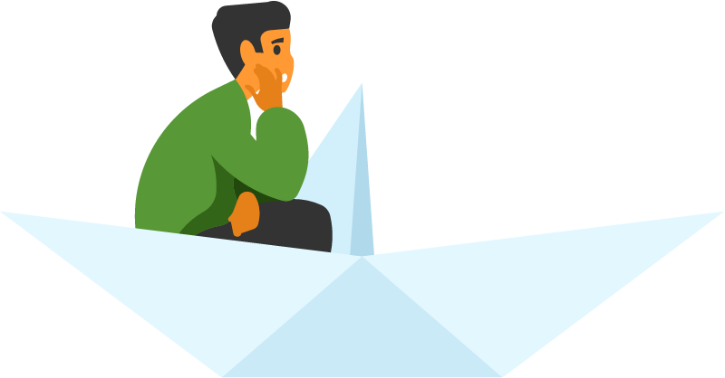Boy Sitting Inside a Paper Boat