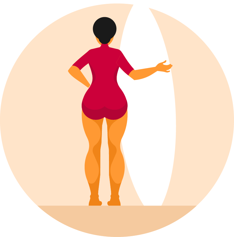 Woman Holding a Surfboard at the Beach
