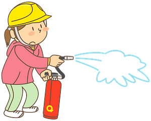 Woman using a fire extinguisher