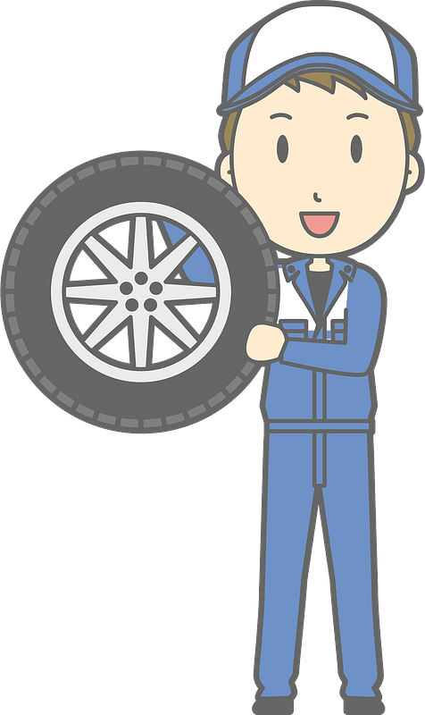 (Todd) Mechanic man is holding a tire