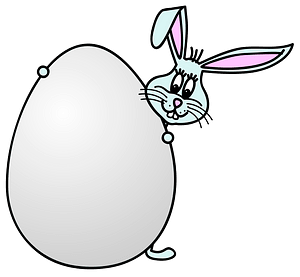 Bunny hiding behind an egg
