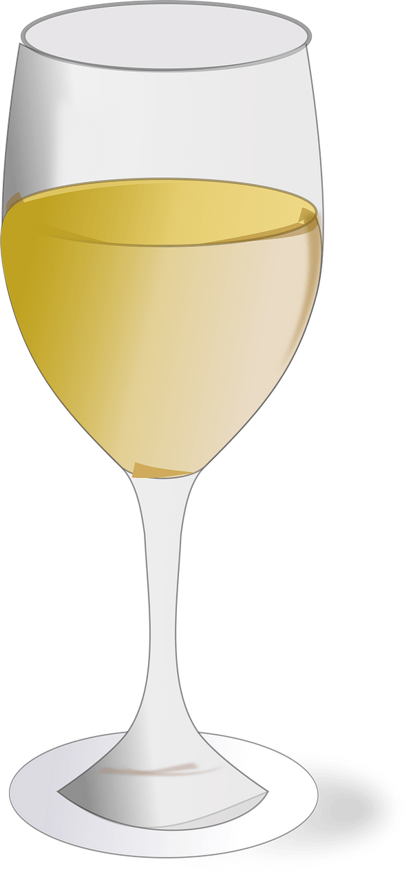 Wine Glass Half Filled with White Wine