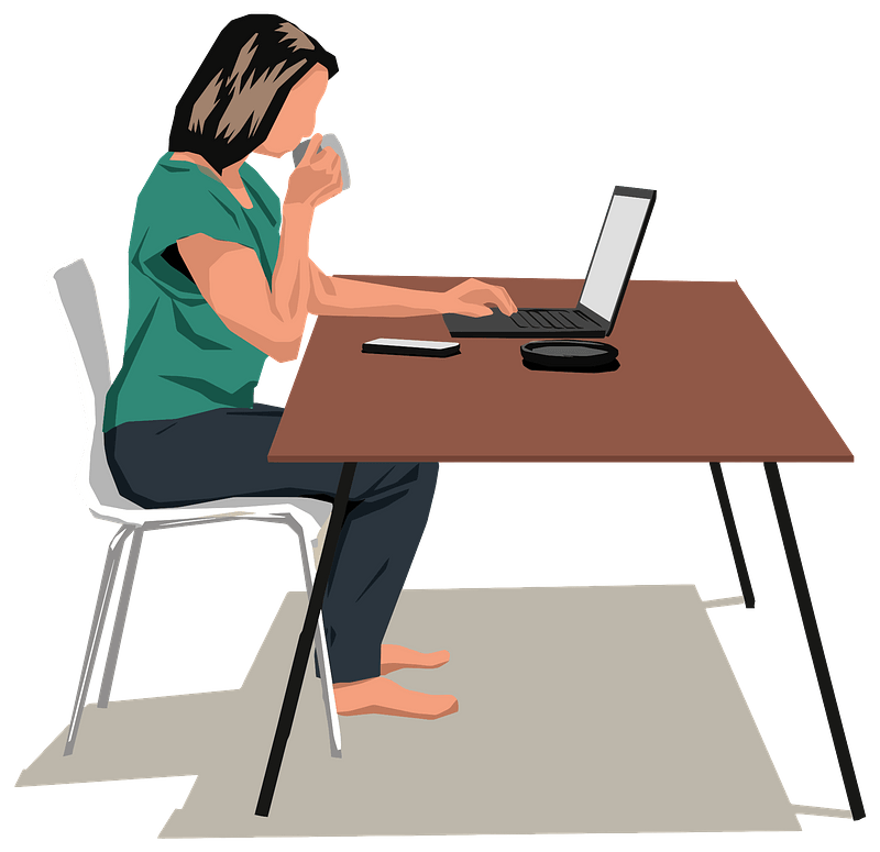 Woman Sitting at Table