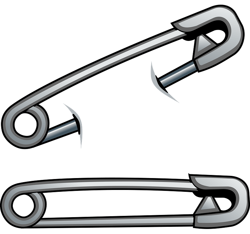 Safety Pins - One Used and One Unused