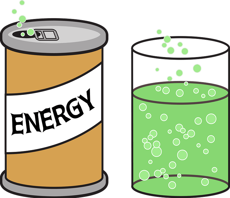 Can of Energy Drink Poured into a Glass