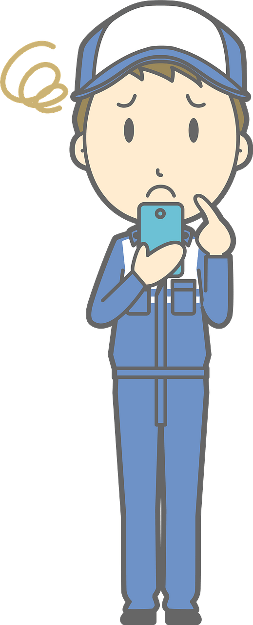 (Todd) Mechanic Man is Looking at His Smartphone