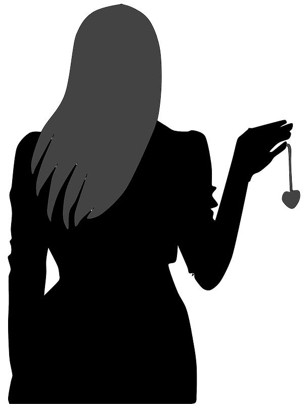 Womans Holding Heart Locket