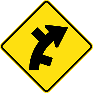 (W2-12) Staggered side road intersection, first from right on a curve on right