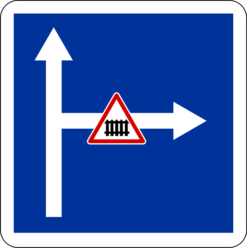 Level crossing with gates on side road