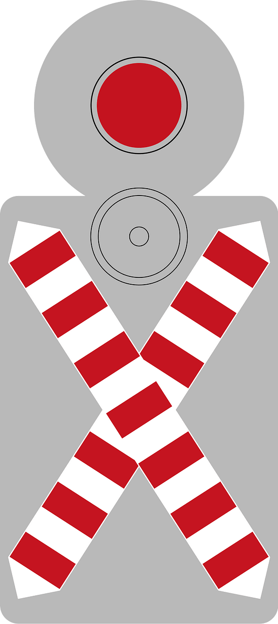 Level crossing without gates and with a flashing red warning light (single track)