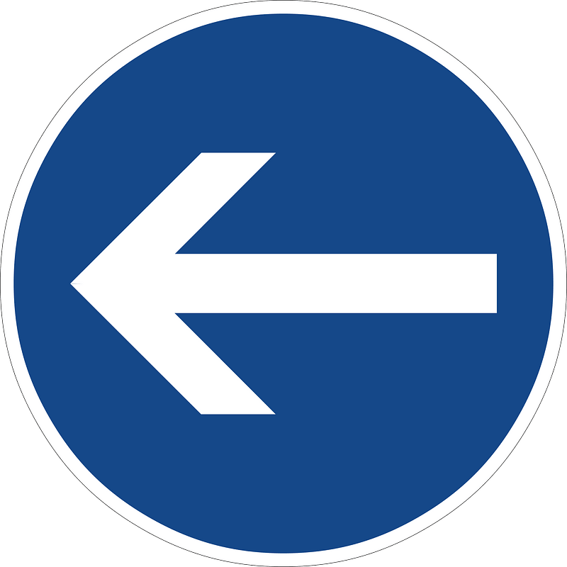 Turn left here (in front of the sign)