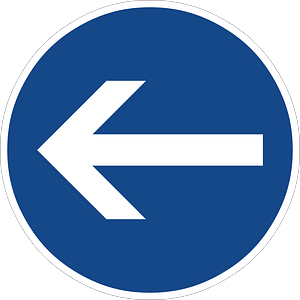 Turn left here (in front of the sign)