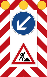 Moveable road barrier