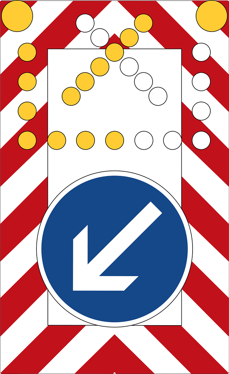 Moveable road barrier with flashing arrow