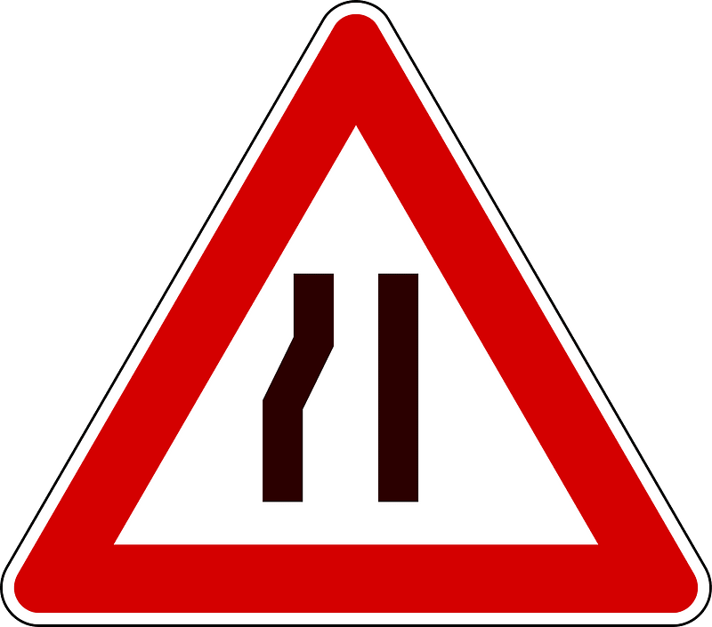 Road narrows on left
