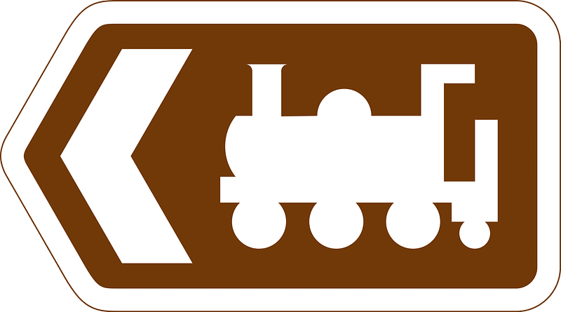 Direction to tourist attraction indicated by a symbol