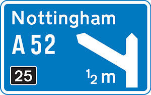 Motorway junction ahead, displaying the route number and destination reached by taking this route