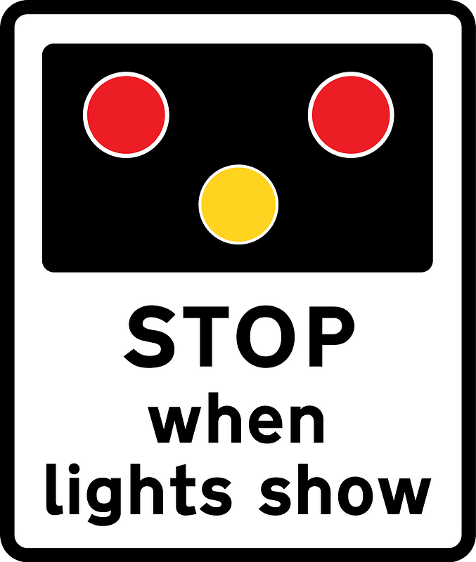 Warning of light signals at a level crossing ahead (the sign may also be used at a lifting bridge or airfield)
