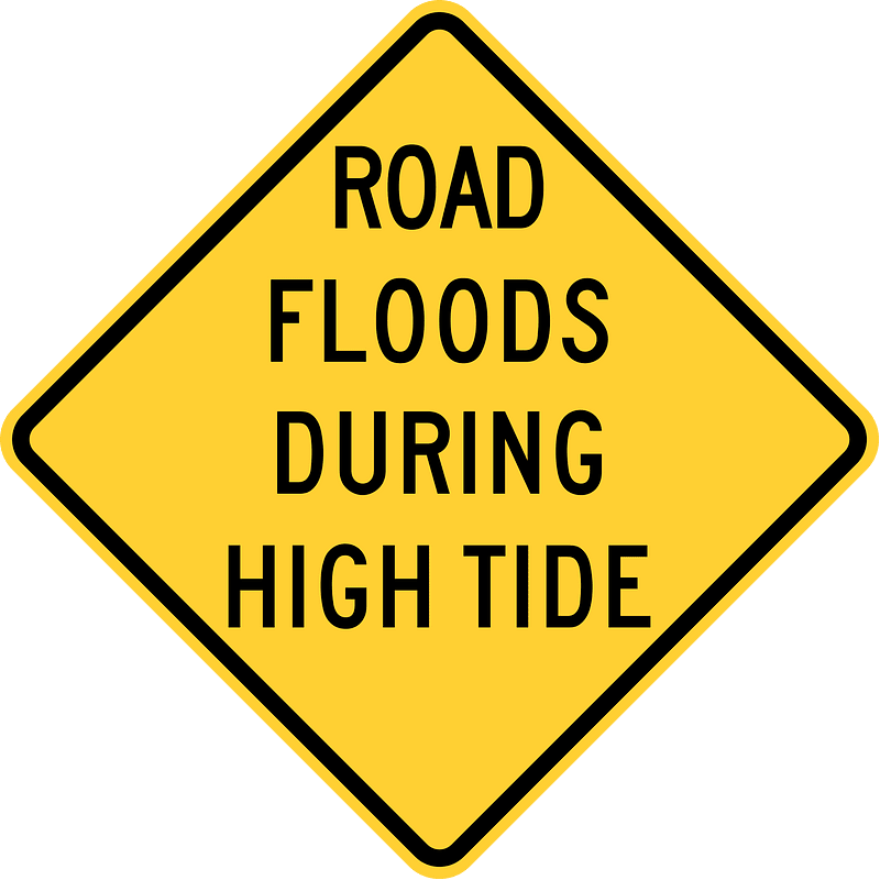 Road floods during high tide, Hawaii