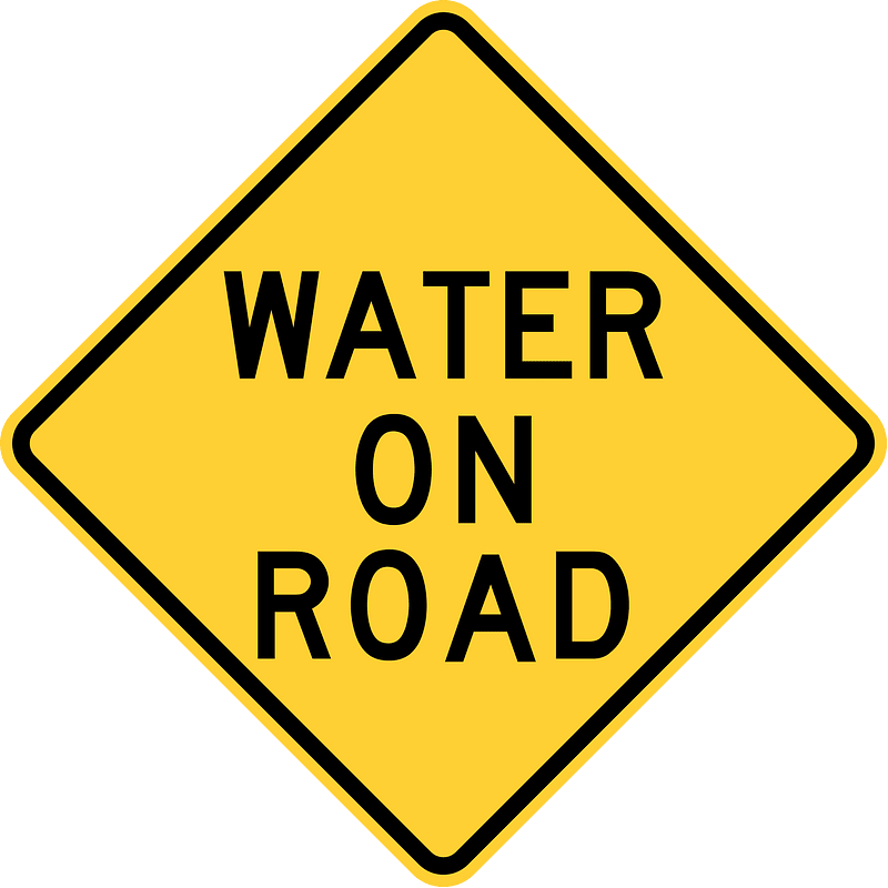 Water on road, Delaware and Missouri