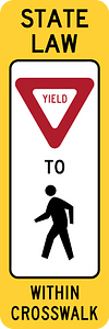 R1-6: In-Street Ped Crossing (The legend STATE LAW is optional. A fluorescent yellow-green color may be used instead of yellow for this sign.)