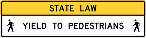 R1-9: Overhead Ped Crossing (The legend STATE LAW is optional. A fluorescent yellow-green color may be used instead of yellow for this sign.)