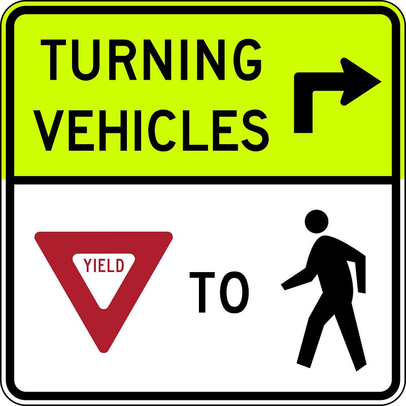 Turning vehicles yield to pedestrians