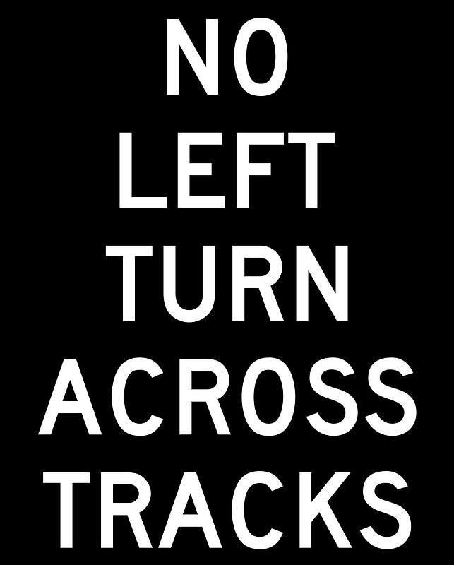 No Left Turn Across Tracks