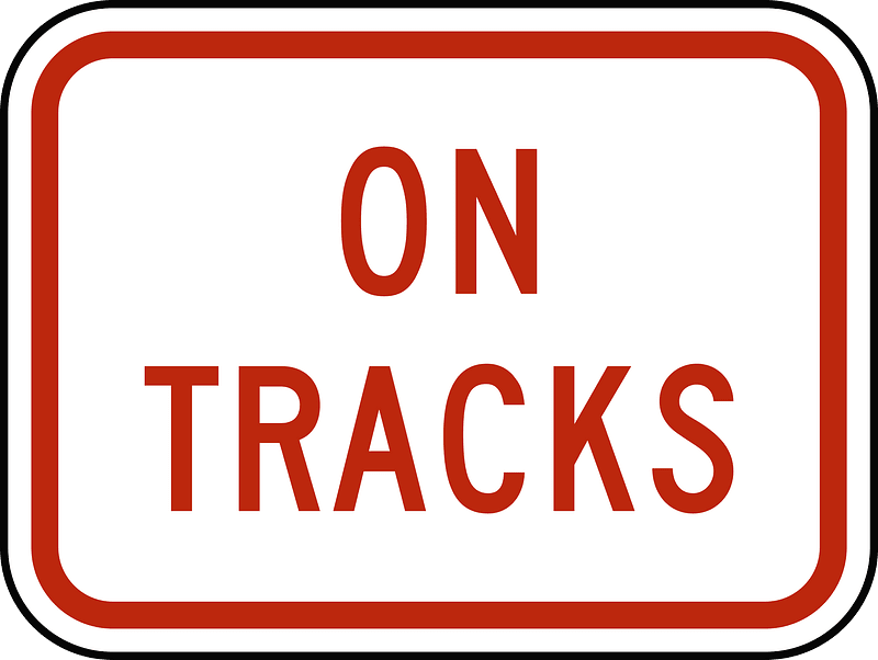 On tracks plaque