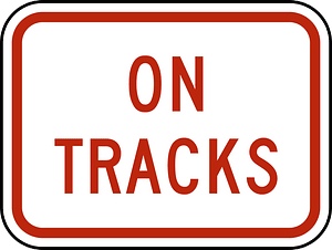 On tracks plaque