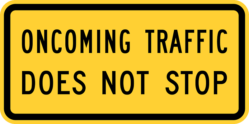 Oncoming traffic does not stop (plaque)
