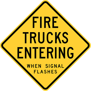 Fire trucks entering when signal flashes, Wisconsin